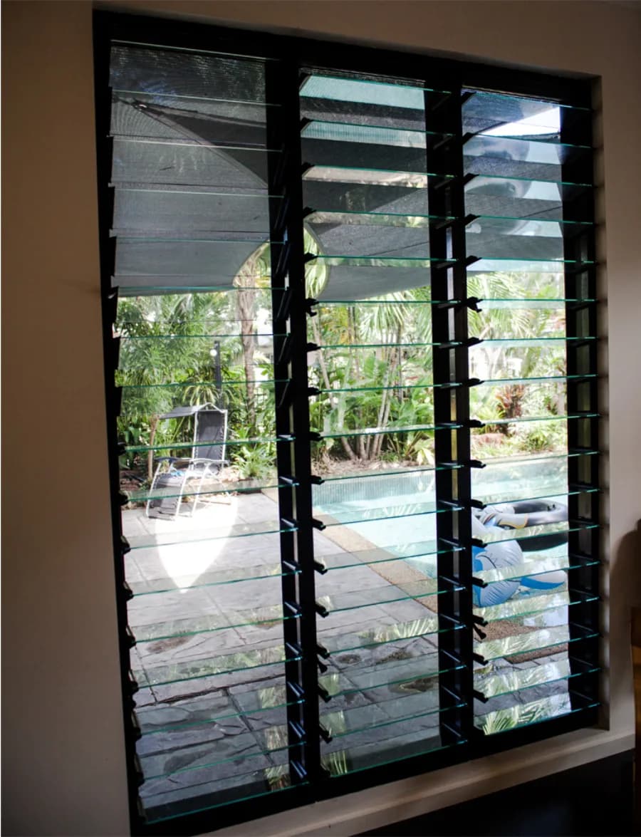 Louvre windows with tropical garden view — Window Works NT project in Darwin