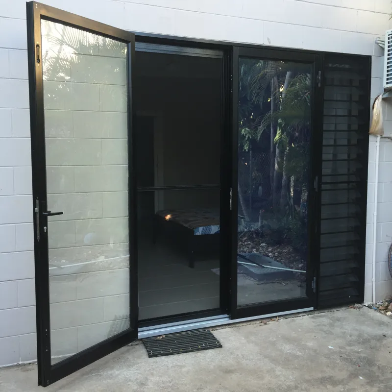 Black aluminium french doors with security screen